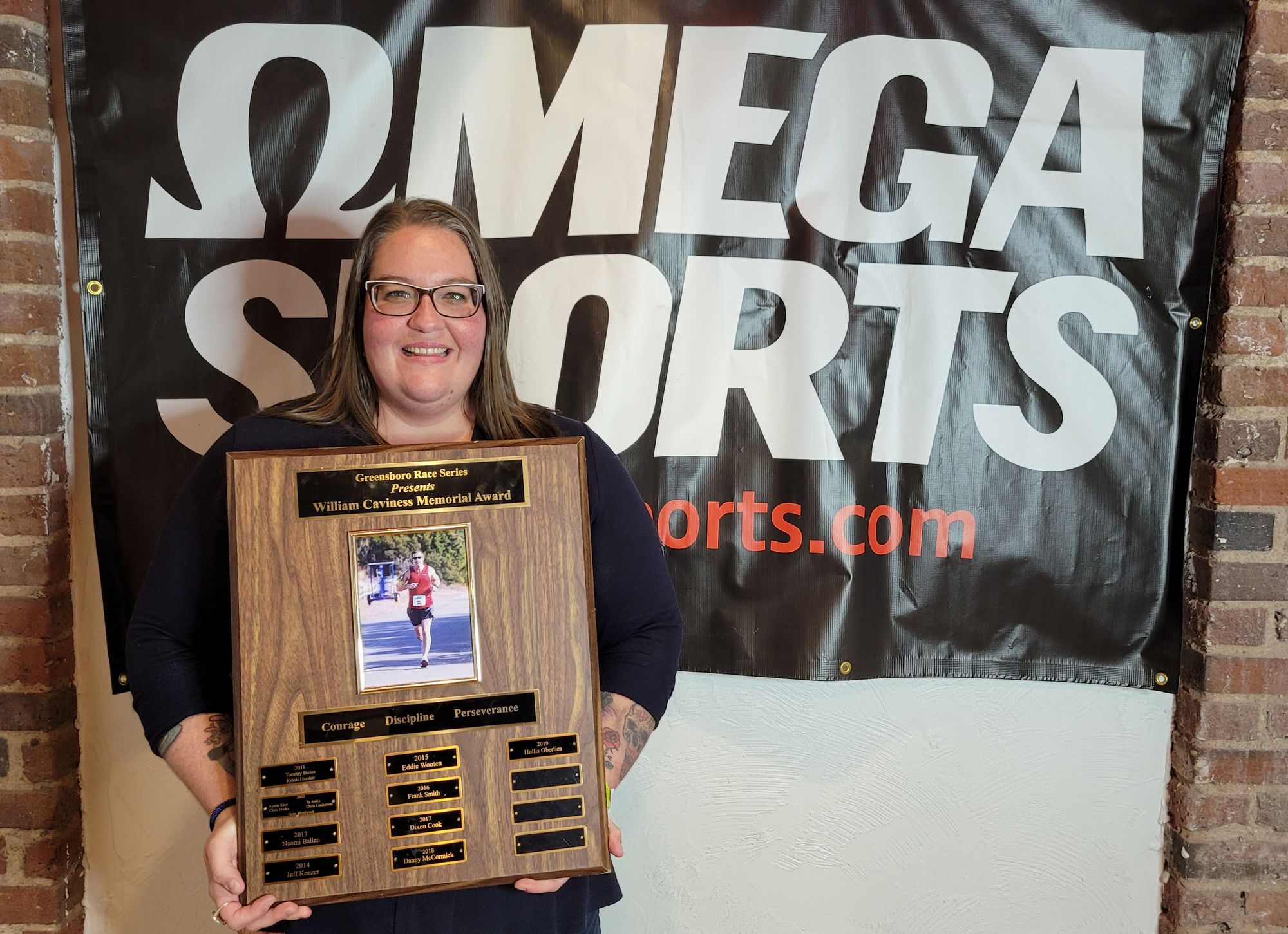 Sarah Hampton receives Will Caviness Award from Omega Sports Race Series